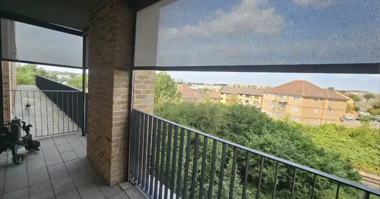 Modern zip screen for balcony in East London providing shade and wind protection-HomeDecision